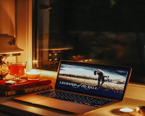 A laptop screen showing structured text data with properly adjusted dim brightness in a home environment